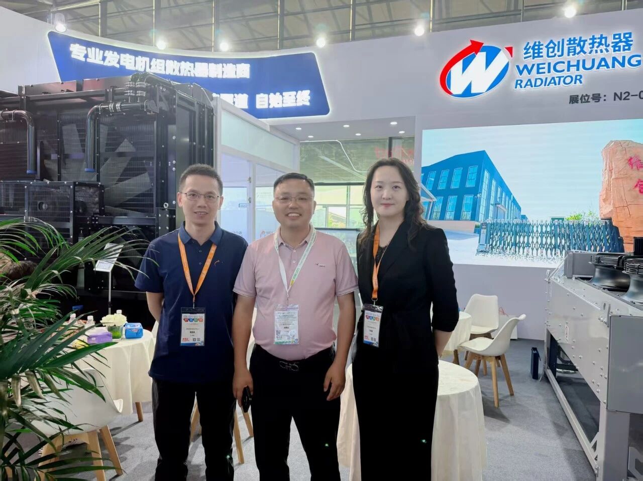 Group photo at the Weichuang Radiator booth